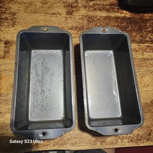 Two metal loaf pans